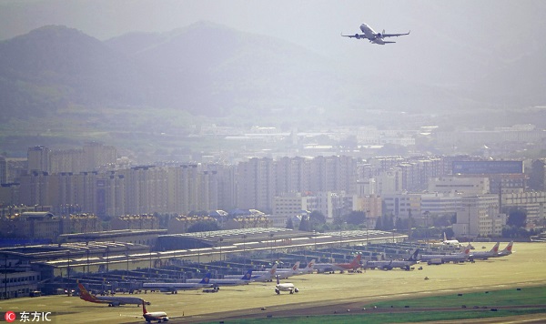 1534922768916043771.jpg 2018年8月11日,一家航班从大连机场起飞。.jpg