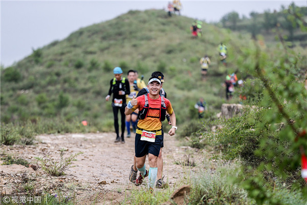 1534239827030099873.jpg Runners compete at the ultramarathon.jpg