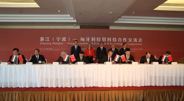 1559266284564043404.jpg 签协议.jpg