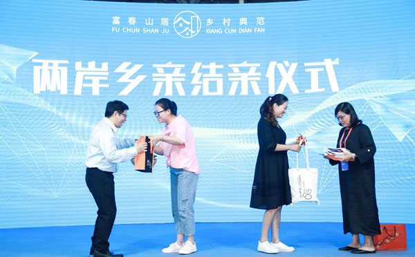 1561347198043089782.jpg 两岸.jpg