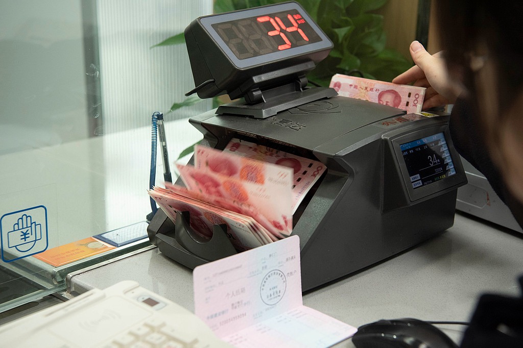 Stronger RMB seen stabilizing currency system