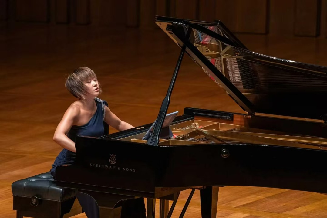 13 encores seal pianist's triumphant return