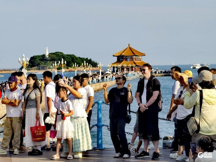 Qingdao's Zhanqiao Pier glows at sunset