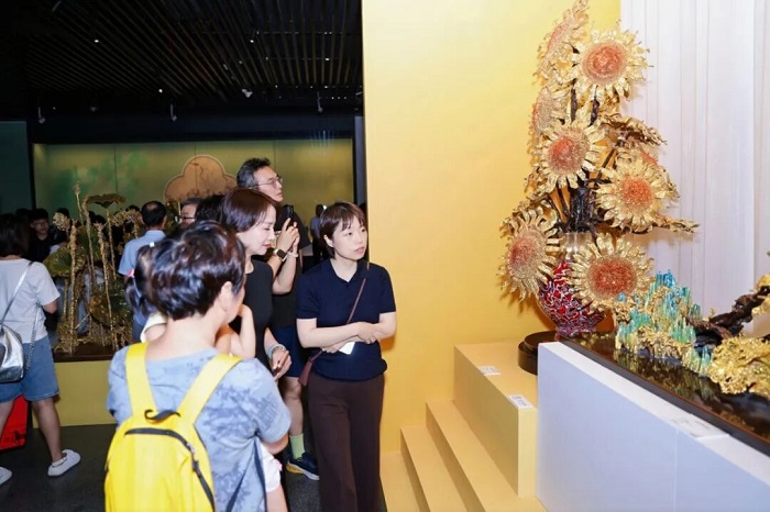 Father-son duo marks 20 years of melted copper art with joint exhibition in Wuxi