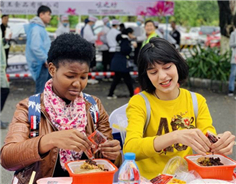 Guangxi marks Sanyuesan Festival with folk choirs, snail noodles