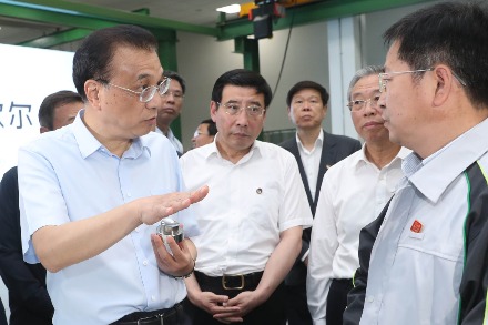 Li: Tax, fee cuts help stimulate vitality