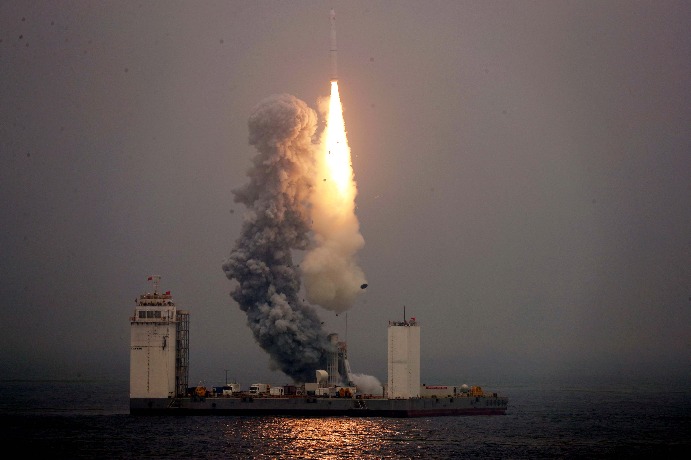 China launches first rocket into space from platform at sea