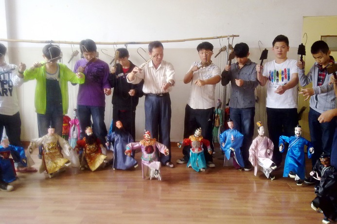 Strategy for training coming generations of Fujian puppetry practitioners