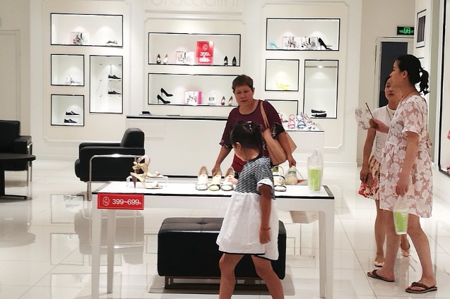 More Chinese plan for spending increase: Survey