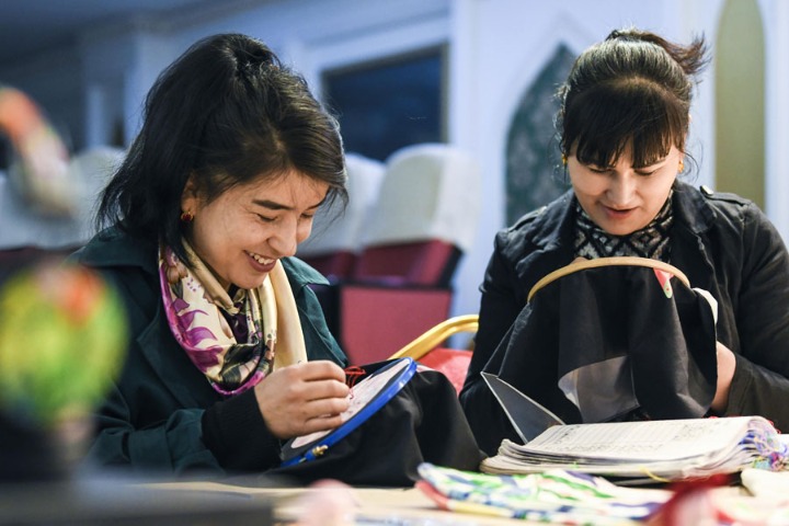 Villagers embrace new life after relocation projects in Xinjiang