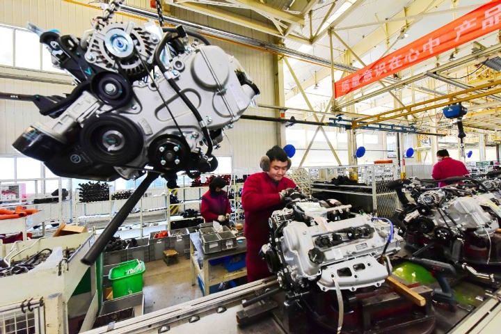 China's manufacturing PMI stays at 50.2 in December