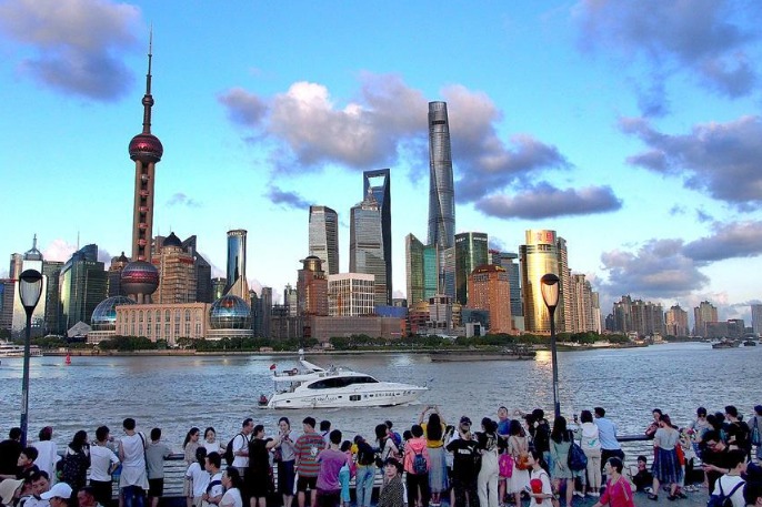 OECD raises economic outlook on better-than-expected China, US recoveries