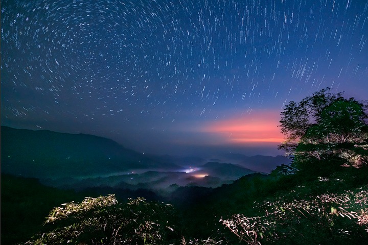 Starry sky under morning sunglow looks like fairyland