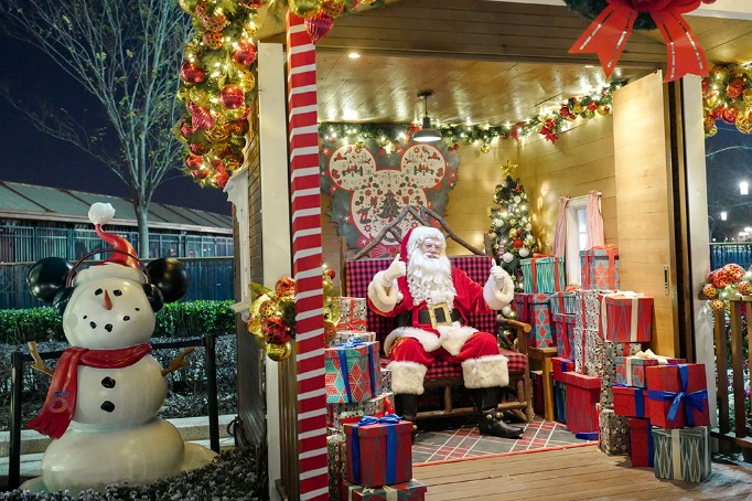 Santa Claus in Disneytown welcomes tourists