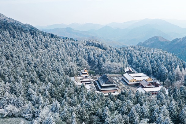 Frosty rime-covered mountain resembles winter fairyland