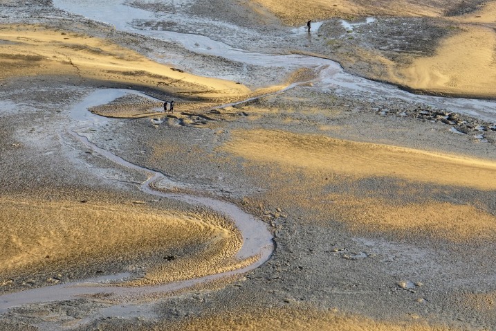 Beach reveals calm scenery after spring ebb tide