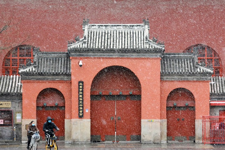 Imperial towers get a dusting after rare snowfall in Beijing