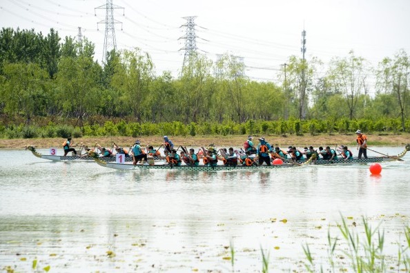 Dragon boats hit water during holiday