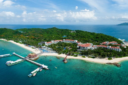 Hainan island invites tourists to a summer of parachute jumping and more