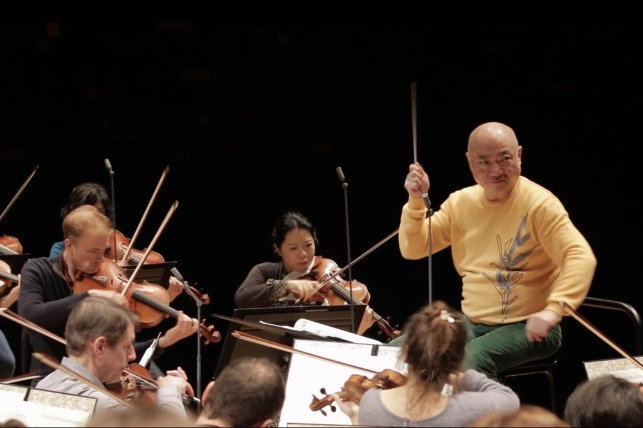 Chinese maestro wields baton at Paris concerts