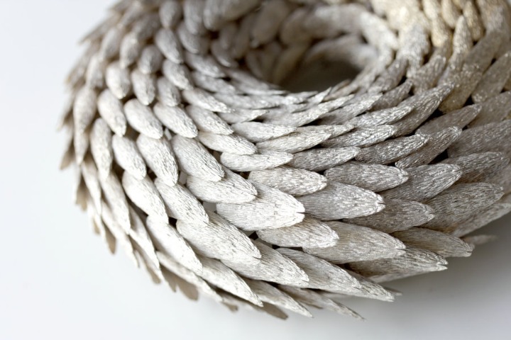 Artist Han Chang displays his jewelry pieces in Beijing