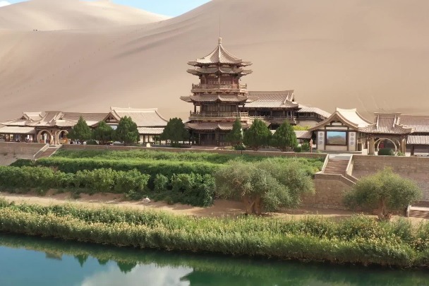 Discover the allure of Singing Sand Dunes and Crescent Moon Spring scenic area