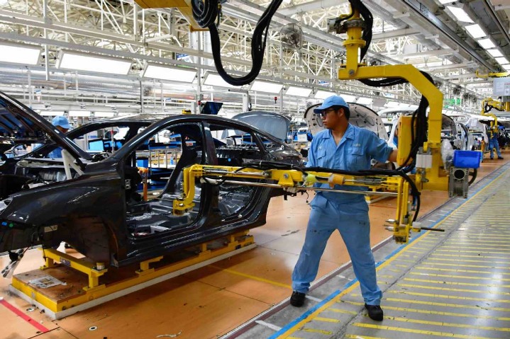 Carmakers urged to improve NEV quality