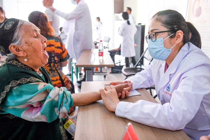 Pairing assist programs key in Xinjiang