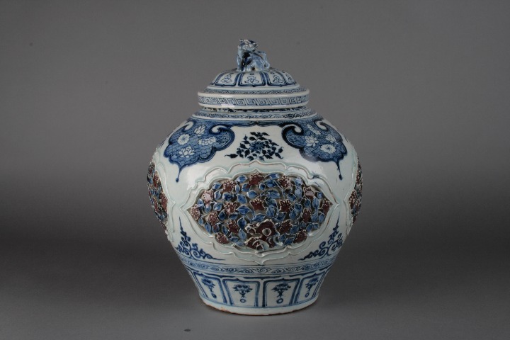 Yuan Dynasty lidded jar with blue-and-white and under-glazed red decorations
