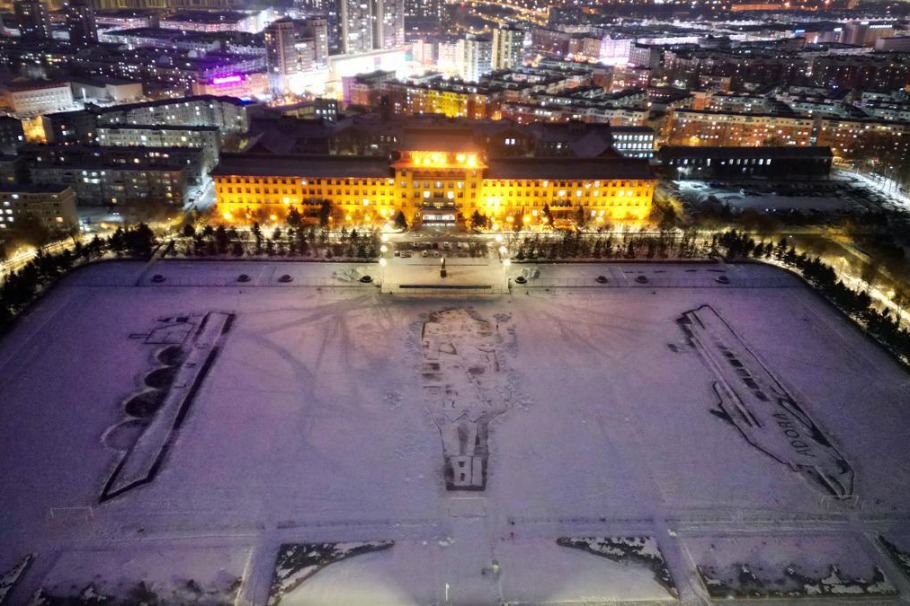 Harbin Engineering University students create massive snow sketches to welcome the new year