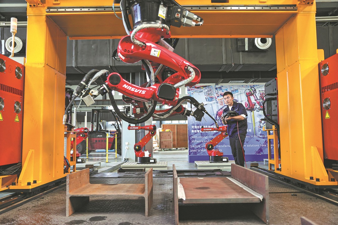 Experts call for more efforts in robotics