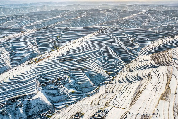 Snow-capped terraced fields in Gansu