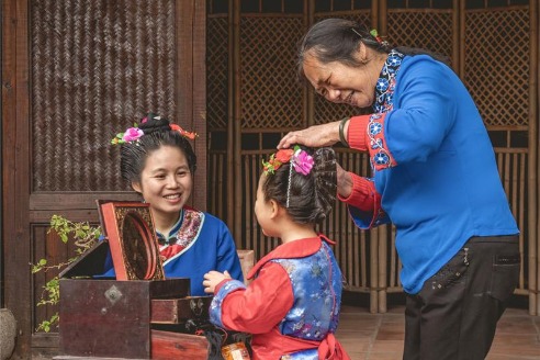The symbolism behind Meizhou's Mazu chignon headdress