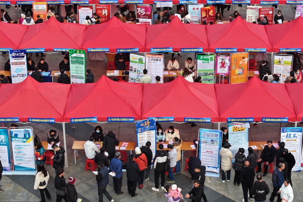 China's surveyed urban jobless rate narrows in May