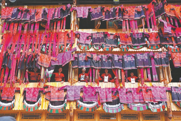 Boosted by tradition, Yao village rides high on tourism