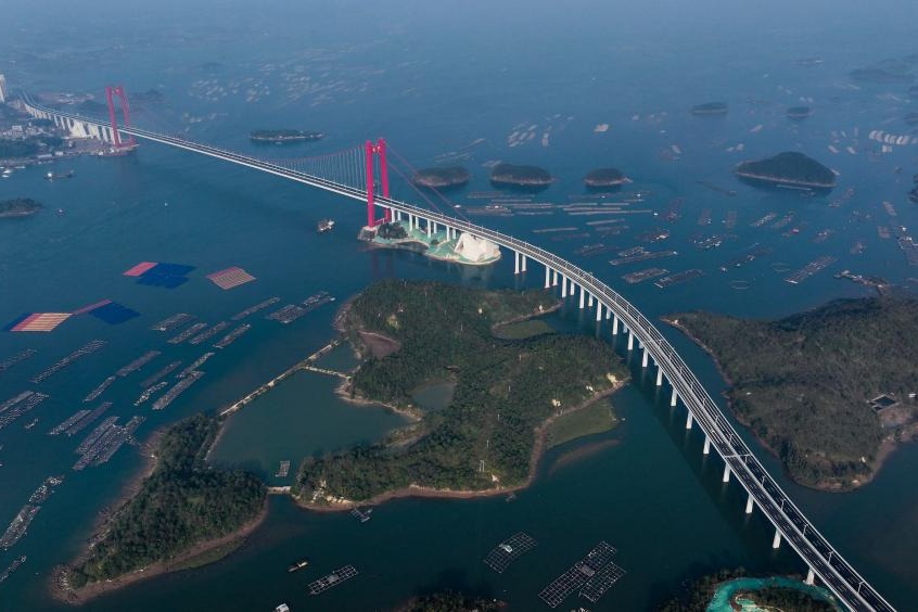 Longest cross-sea bridge in China's Guangxi opens to traffic