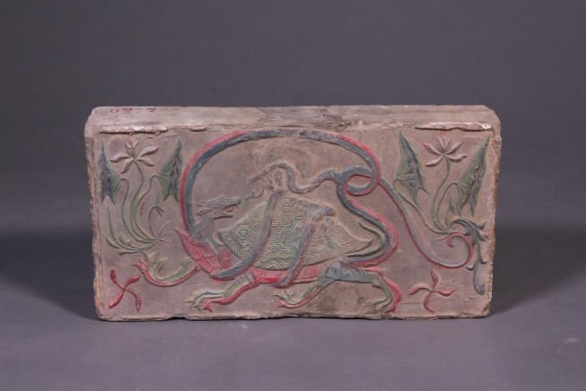 5th-century portrait brick depicts tortoise intertwined with snake