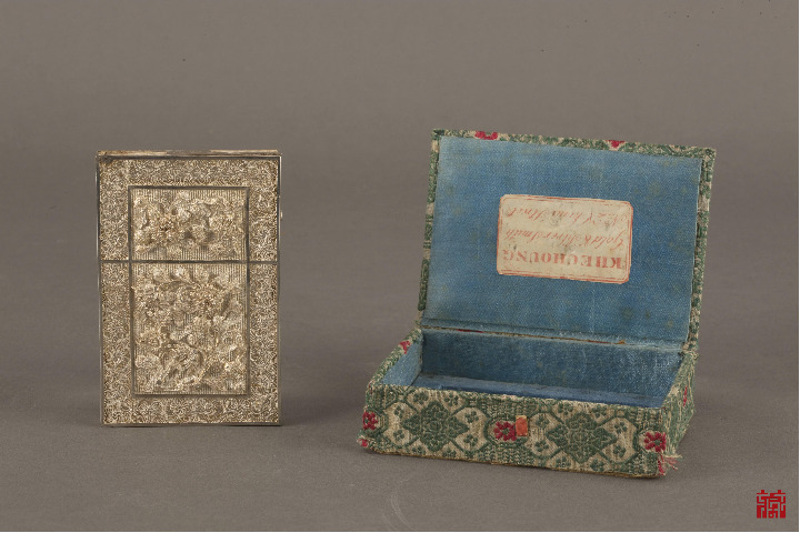 Silver filigree business card case decorated with flower and snake motifs