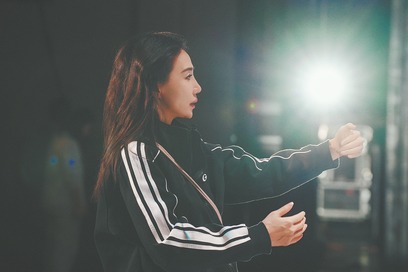 Pop star returns to her ethnic Miao roots