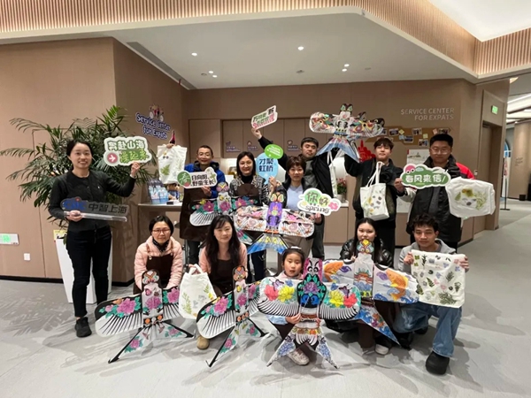 Intl families experience Chinese culture with springtime traditions in Hongqiao