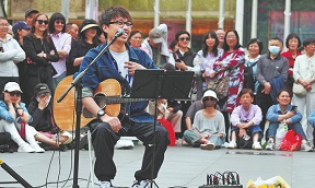 Street singer busks his way into hearts