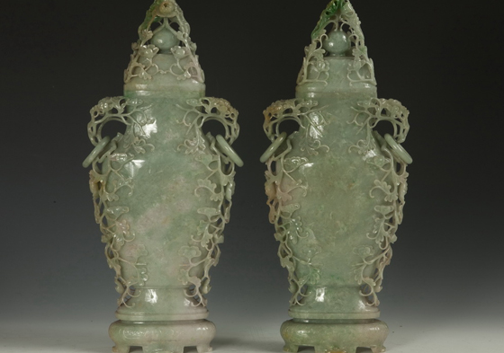 Paired jadeite vases with openwork decorative motifs