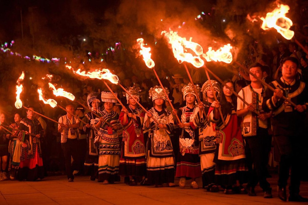 Guizhou lights up for annual Torch Festival