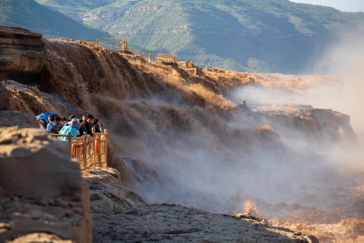 Twin waterfalls emerge at Hukou Waterfall on the Yellow River