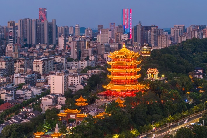 Nighttime at Yellow Crane Tower attracts summer crowds