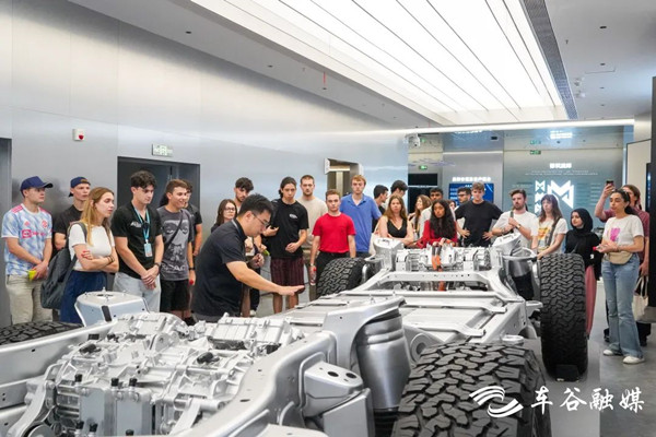 International students praise WEDZ's automobile achievements