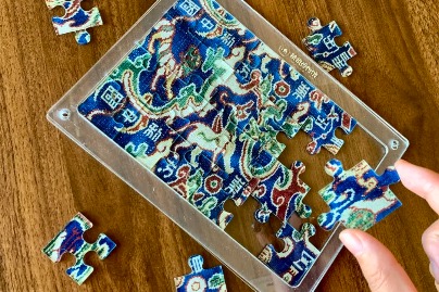 Innovative jigsaw recreates beauty of 2,000-year-old brocade arm guard