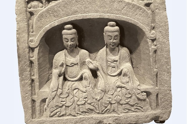 Twin Buddhas carved in stone niche from Shanxi