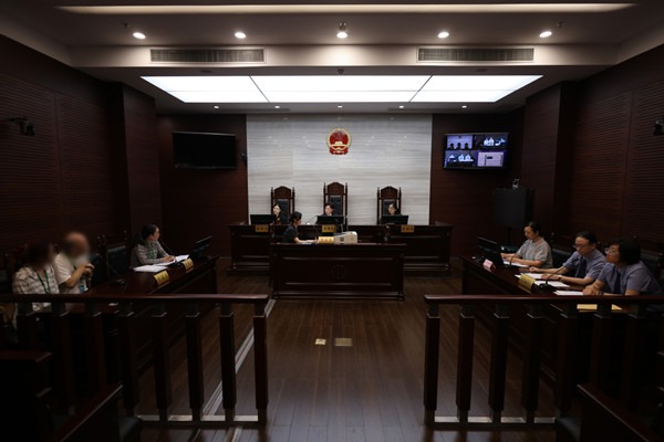 Shanghai court appoints grandfather as guardian of US-born children