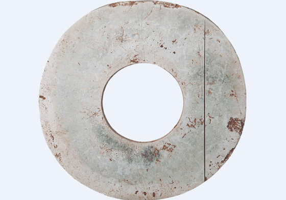 Green jade disc serves as ritual object in Neolithic period